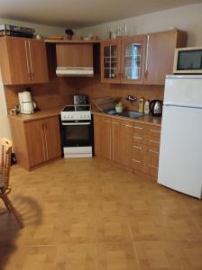 Kuchyň nebo kuchyňský kout v ubytování Rekreačný dom Bystrá + 3 fotografie