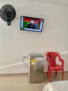 Televisyen dan/atau pusat hiburan di Habitaciones coveñas