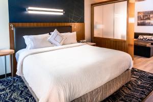 Postel nebo postele na pokoji v ubytování SpringHill Suites by Marriott Houston Baytown