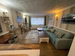 Et opholdsområde på 3 Bed Room House very close to town