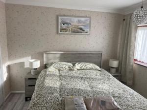 En eller flere senge i et værelse på 3 Bed Room House very close to town