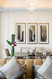 a living room with a couch and a table at The St. Regis Chengdu in Chengdu