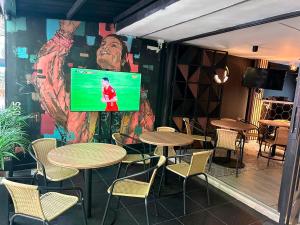 TV a/nebo společenská místnost v ubytování Provenza Medellin Hotel Boutique