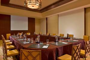 a conference room with a long table and chairs at The Westin Playa Bonita Panama in Playa Bonita Village +79 photos