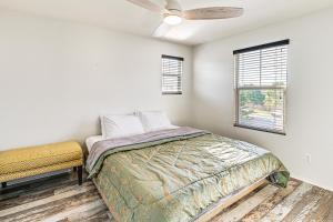 a bedroom with a bed and a ceiling fan at 20 Mi to Old Town San Diego Stay and Play! in Chula Vista +23 photos