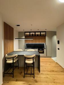 Η κουζίνα ή μικρή κουζίνα στο F Apartments