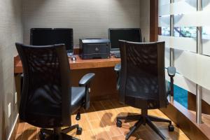 TV a/nebo společenská místnost v ubytování SpringHill Suites Austin South