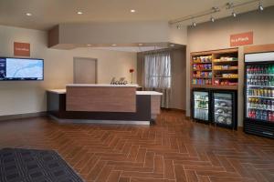 a store lobby with a counter and a refrigerator at TownePlace Suites by Marriott Windsor in Windsor +7 photos