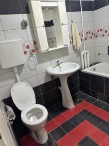 Et badeværelse på Apartman Riven