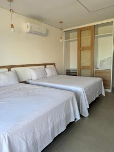 Casa Glass Lux客房内的一张或多张床位
