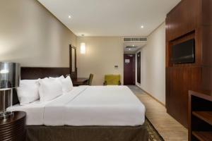 Postel nebo postele na pokoji v ubytování Protea Hotel by Marriott Owerri Select