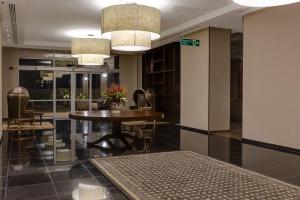 Posezení v ubytování Protea Hotel by Marriott Owerri Select