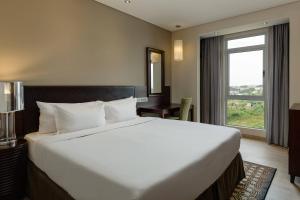 Postel nebo postele na pokoji v ubytování Protea Hotel by Marriott Owerri Select