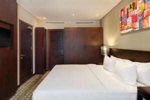 Postel nebo postele na pokoji v ubytování Protea Hotel by Marriott Owerri Select
