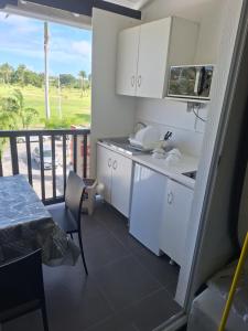Kuchyň nebo kuchyňský kout v ubytování Appartement Duplex Marine 5