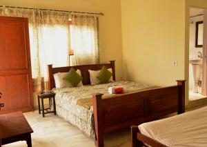 Letto o letti in una camera di Sneh Deep Guest House