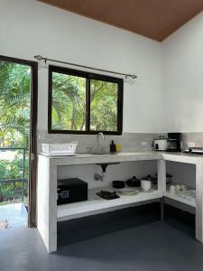 Giường trong phòng chung tại Studio Koba 6