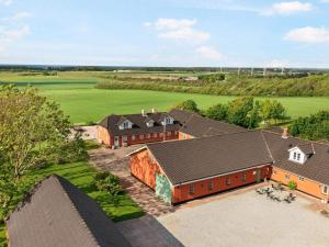 an overhead view of a farm with houses and trees at Cozy Coastal Retreat - By Traum Ferienwohnungen in Hjørring +9 photos