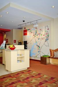 a room with a wall with a map on it at TownePlace Suites by Marriott Charlotte Mooresville in Mooresville +48 photos