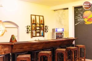 a bar in a restaurant with stools around it at Chiller Jone's place in Tangalle +63 photos