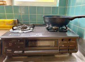 Whole house rental 天然温泉付きコテージRAI駐車場付き黒川温泉街まで車で5分的厨房或小厨房