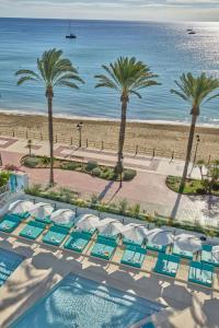 a view of the beach and the pool at a resort at W Ibiza in Santa Eularia des Riu