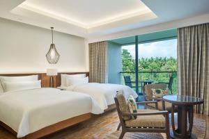 Postel nebo postele na pokoji v ubytování The Westin Resort & Spa Ubud, Bali