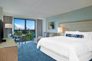 Letto o letti in una camera di Walt Disney World Swan