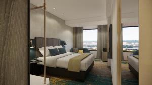 Katil atau katil-katil dalam bilik di Mercure Madiun