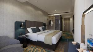 Katil atau katil-katil dalam bilik di Mercure Madiun