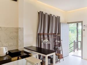 Kuchyň nebo kuchyňský kout v ubytování Moonway Bungalows