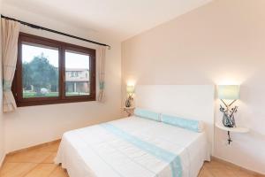 Postel nebo postele na pokoji v ubytování Apartments with shared pool Vignola Mare Aglientu