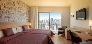Postel nebo postele na pokoji v ubytování RH Princesa Hotel & Spa 4* Sup