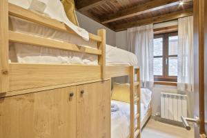 Postel nebo postele na pokoji v ubytování Luderna - Dúplex Val de Ruda C1 de Carlac