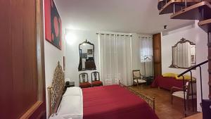 Postel nebo postele na pokoji v ubytování CASA DEL CORSO
