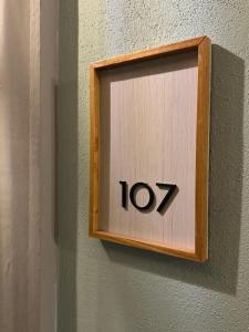 a lightswitch on a wall with the number at Hotel Posada Real in Lagos de Moreno