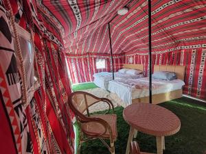 Postel nebo postele na pokoji v ubytování Sky Window Camp