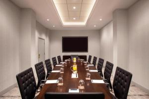 a conference room with a long table and chairs at Sheraton Philadelphia University City Hotel in Philadelphia