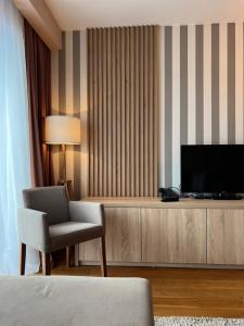 TV a/nebo společenská místnost v ubytování Apartman B328-Aparthotel Vučko Jahorina