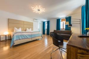 Postel nebo postele na pokoji v ubytování Hotel Wandinger Hof by Lehmann Hotels