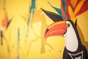 a painting of a penguin on a wall at Costa Rica Bibione Aparthotel in Bibione