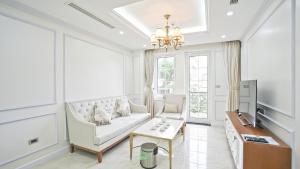 Posezení v ubytování Luxe Paradise Residence 79 Nguyen Du