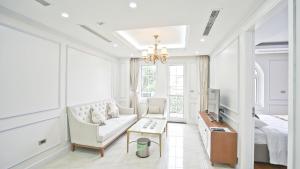Posezení v ubytování Luxe Paradise Residence 79 Nguyen Du