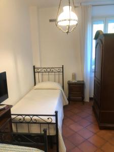 A bed or beds in a room at Villa Brizzi