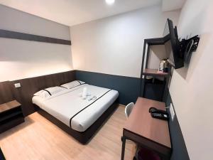 TV a/nebo společenská místnost v ubytování Smile Hotel Subang USJ