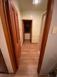 a hallway with two open doors and a hallway at Oultan Homestead Farm Stay in Ikamatua +10 photos