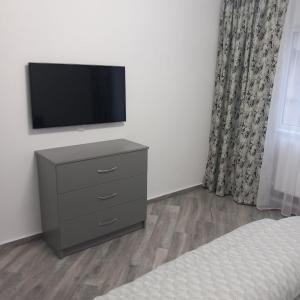 TV a/nebo společenská místnost v ubytování Apartament Ramnicu Valcea