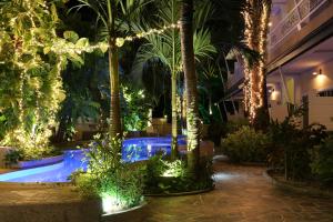 Zahrada ubytování Naka Resort + 37 fotografií