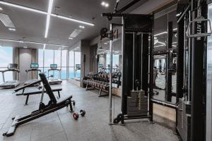 Panorama Beach Pearl Nha Trang Residences的健身中心和/或健身设施