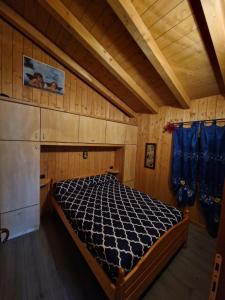 Voodi või voodid majutusasutuse Ciapin House toas